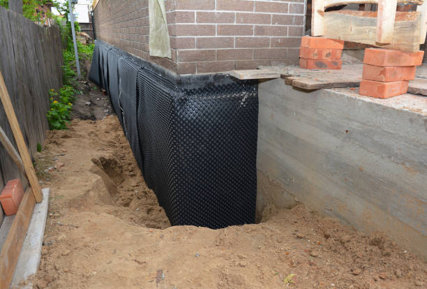 Happy homeowners after waterproofing job in Brant